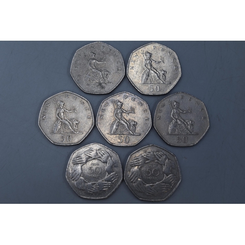 155 - A Selection of Seven Collectable Old 50p Coins.