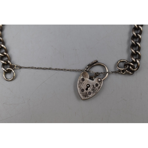 11 - Hallmarked Birmingham Silver Bracelet with padlock Clasp and pixie Charm