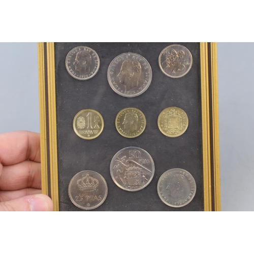 157 - A Framed and Glazed Set of Spanish Coins.