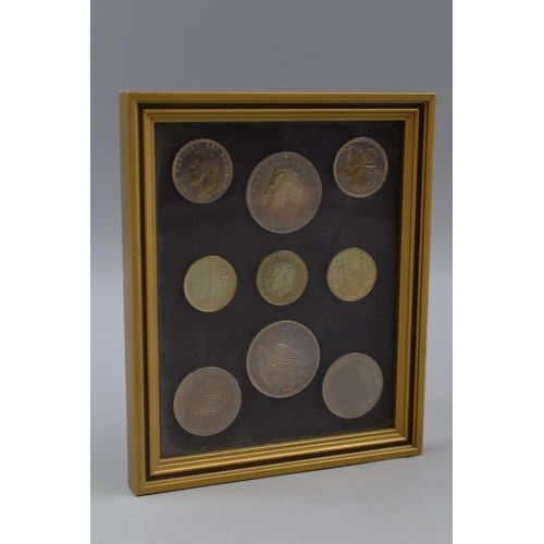 157 - A Framed and Glazed Set of Spanish Coins.