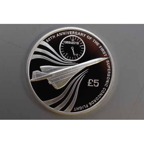 16 - A Silver Proof UK £5 Crown Coin, Celebrating The 50th Anniversary of Concorde. With Presentati... 