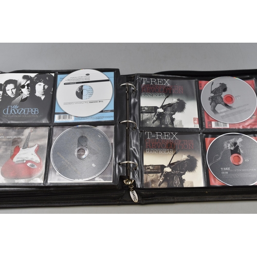 459 - Emtec CD Case Containing approx 112 Discs including Status Quo, The Beach Boys, Meat loaf and lots M... 