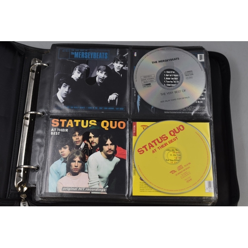 459 - Emtec CD Case Containing approx 112 Discs including Status Quo, The Beach Boys, Meat loaf and lots M... 