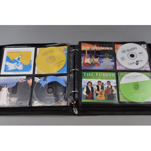 459 - Emtec CD Case Containing approx 112 Discs including Status Quo, The Beach Boys, Meat loaf and lots M... 