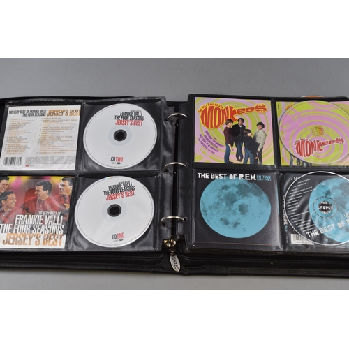 459 - Emtec CD Case Containing approx 112 Discs including Status Quo, The Beach Boys, Meat loaf and lots M... 