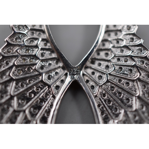 4 - A 925. Silver Angel Wing Necklace, With Two 925. Silver Pendants ('Shine Bright' and Star) on 925. S... 