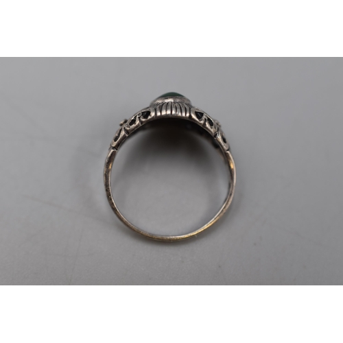 27 - A Sterling Silver Green Stoned Ring, Size N.