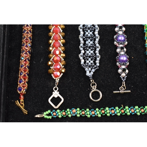 37 - Selection of Hand Crafted Jewellery including Bracelets, Rings and a selection of Charms