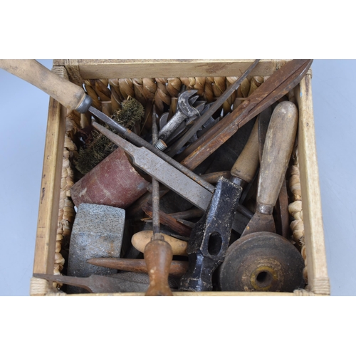 701 - A Selection of Vintage Tools In Rattan Basket. Includes Cobblers Last, Files, Spanners, Hammer Head ... 