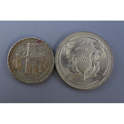 127 - Two Collectable UK Coins. Includes 1986 Scottish Thistle Two Pound Coin and 2005 One Pound Coin.