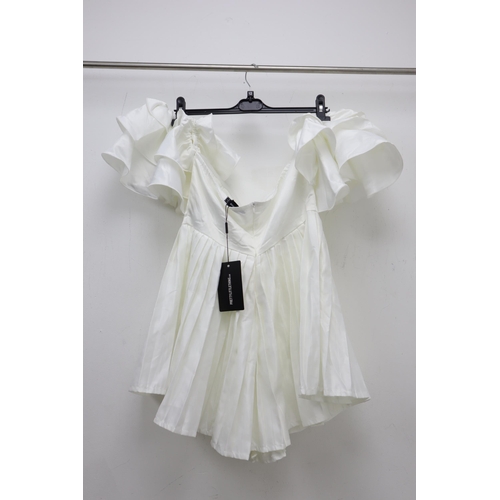 611 - A White Pleated Satin Bardot Frill Sleeve Playsuit, Size 12. Still With Tags.