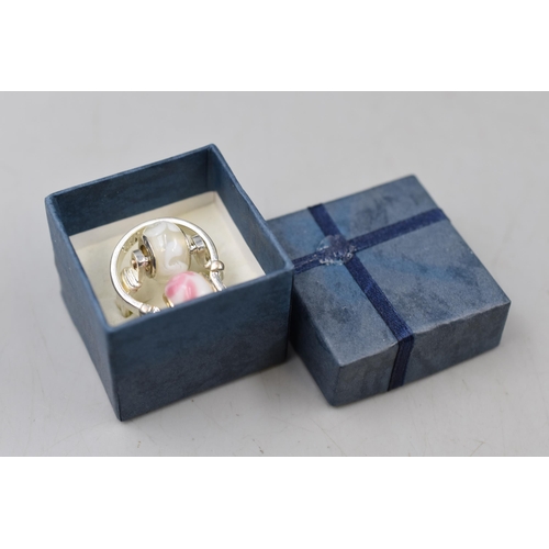 67 - Two Pandora 925. Silver 'Bead It' Rings, With White and Pink Charms. In Presentation Box.