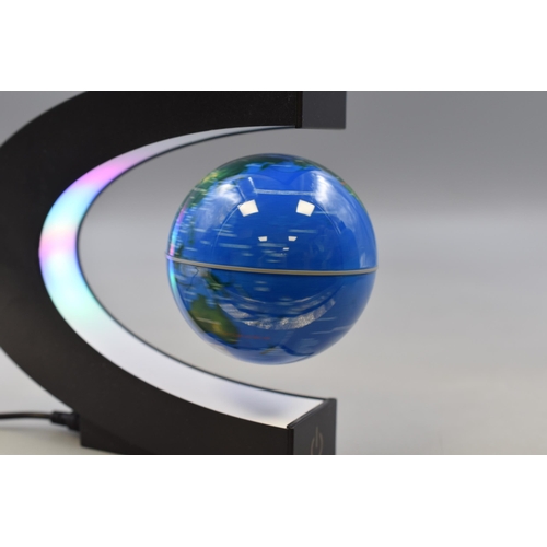 379 - Electro Magnetic Executive Floating Globe Illuminating Desk Toy. Working At Testing