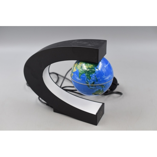 379 - Electro Magnetic Executive Floating Globe Illuminating Desk Toy. Working At Testing