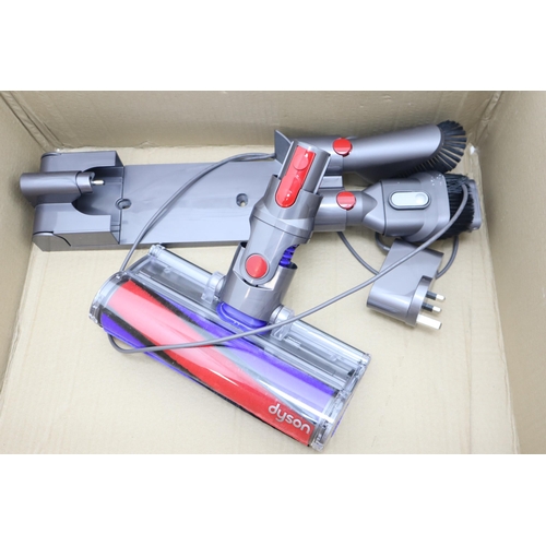 696 - Dyson V8 Absolute Cordless Vacuum Cleaner Includes Charger and Accessories (Powers On When Tested)