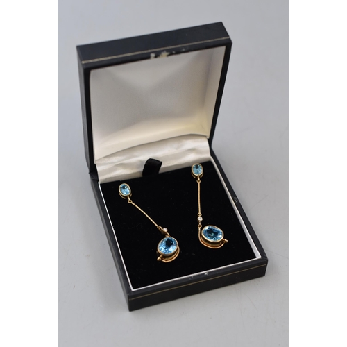 1 - A Pair of 9ct Gold Blue Stoned Earrings, In Presentation Box.