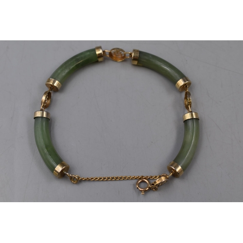 10 - Four Piece Jade Bracelet, With Safety Chain.