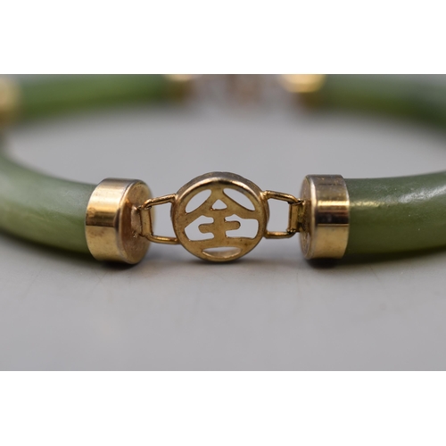 10 - Four Piece Jade Bracelet, With Safety Chain.