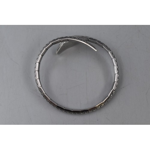 17 - A Sterling Silver K&L Snake Bangle.