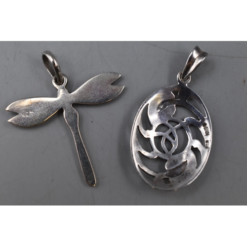 23 - Two 925. Silver Pendants. Includes Macintosh Style and Dragonfly.