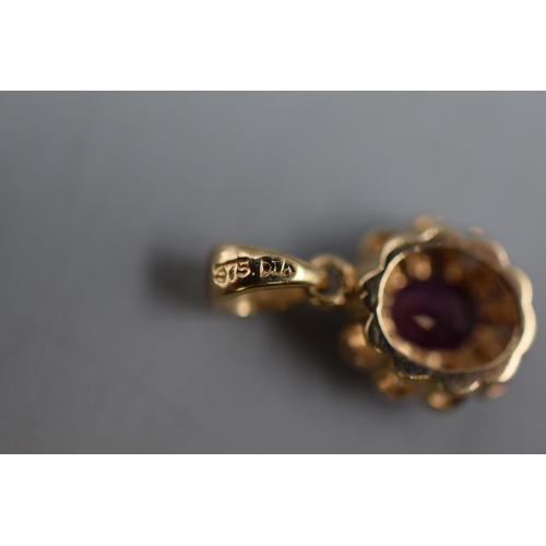 26 - 9ct Gold Ruby Stoned Pendant. Pendant Size approx. 8mm. Total weight approx. 0.93 grams