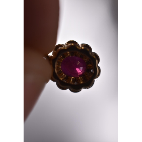 26 - 9ct Gold Ruby Stoned Pendant. Pendant Size approx. 8mm. Total weight approx. 0.93 grams