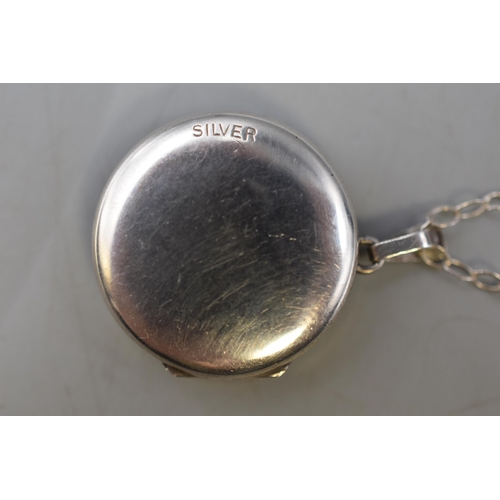 29 - An Etched Silver Locket on 925. Silver Chain.