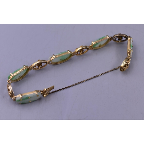 48 - A 14ct Gold Natural Etched Jade Bracelet With Safety Chain, In Presentation Box. With Matching Etche... 