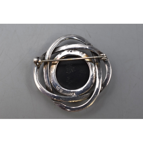 53 - A Large Black Stoned 925. Silver Celtic Style Brooch.