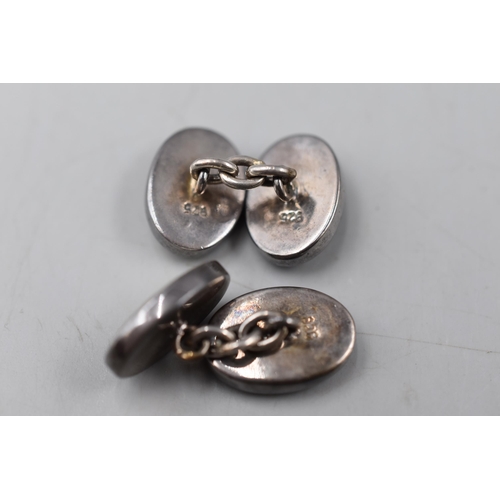 59 - A Pair of 925. Silver Black Stoned and Mother of Pearl Cufflinks.