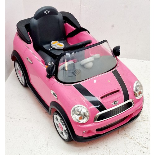 320 - Childs Battery Powered Driveable Mini in Pink. Comes With Remote Control. Working At Testing.  ... 