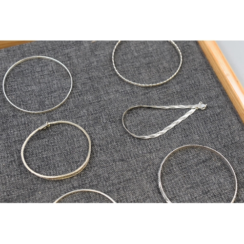 53 - Selection of 9 Silver Bracelets and Bangles