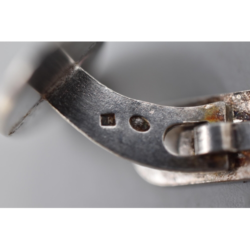 54 - An Etched Sterling Silver Child's Bangle, With a Pair of Eagle Cufflinks (Some Markings).