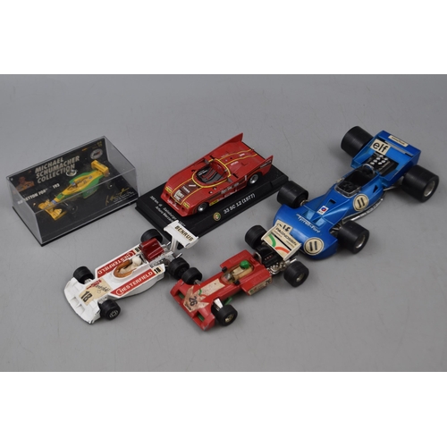 98 - A Selection of Five Die Cast Collectable Racing Cars. Includes Benetton Ford B 193, Alfa Romeo 33 SC... 