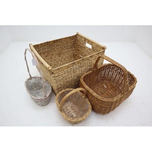 529 - A Selection of Three Wicker Baskets and One Rattan Basket.