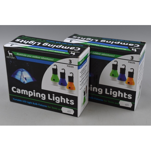 628 - Two Boxes of 3 Astorn Camping Lights