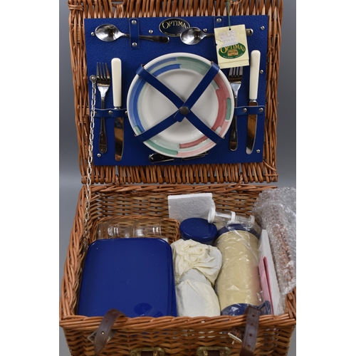 662 - An Optima Wicker Picnic Hamper complete with contents