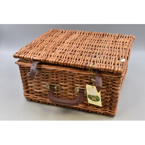 662 - An Optima Wicker Picnic Hamper complete with contents