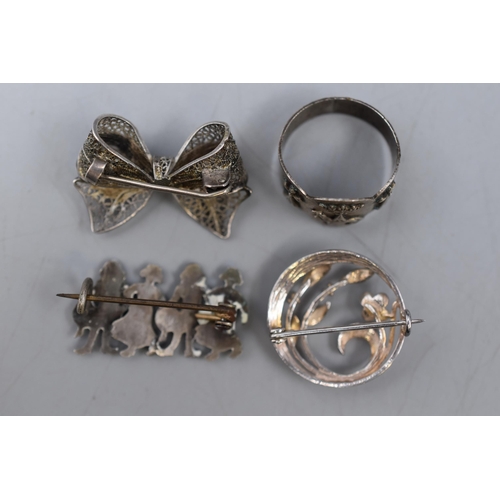 40 - Selection of unmarked Silver Brooches and a Ring with Unidentified Mark