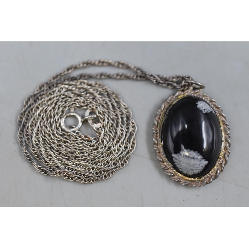 63 - A 925. Silver Black Stoned Pendant, With 925. Silver Chain.