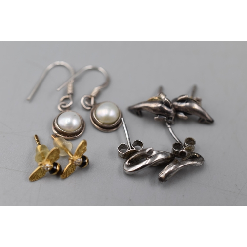 68 - Four Pairs of Silver Earrings