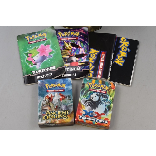 448 - Four Pokemon Card Tins Dating From 2011 & 2014