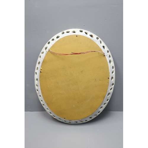 686 - A Wall Hanging Wooden Framed Oval Mirror, Approx 25