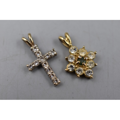 18 - Gold Diamond Stoned unmarked Pendant and a Floral Pendant