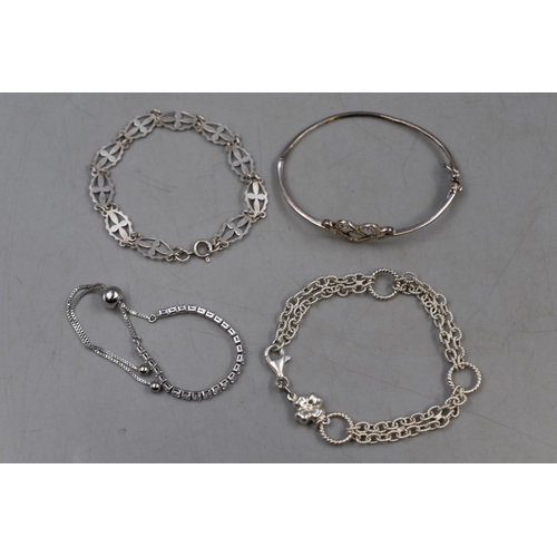 26 - Mixed Selection of Silver 925 Bracelets. Includes Diamante Adjustable Bracelet, Cross Bracelet, Hear... 