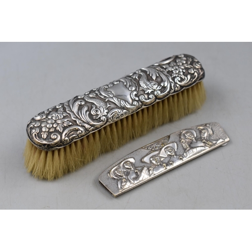 40 - Hallmarked Chester Silver Clothes Brush and a unmarked Cased Comb Possibly Silver