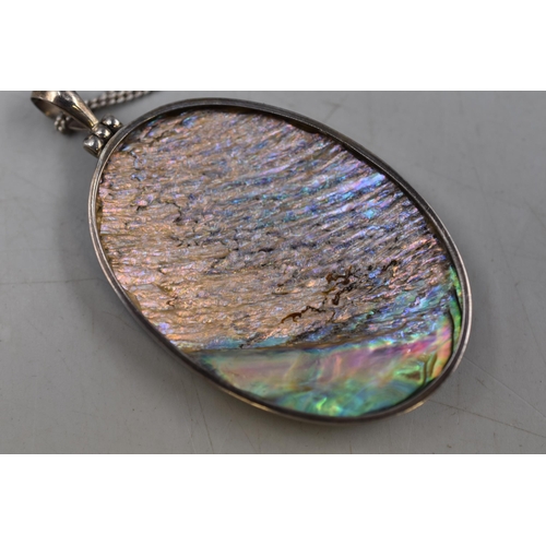 54 - A Large Abalone Shell and 925. Silver Pendant, On 925. Silver Chain. In Presentation Box. Width Appr... 