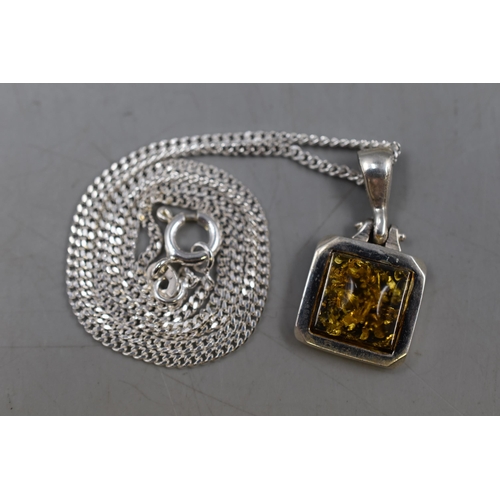 56 - A 925. Silver Amber Stoned Pendant, On 925. Silver Chain. In Presentation Box.