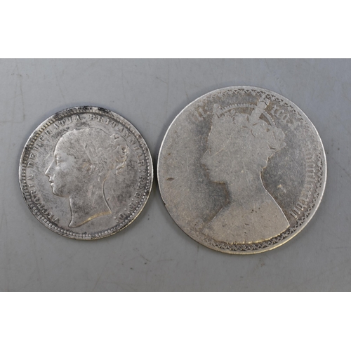 173 - 1872 Victoria Silver Shilling and a 1887 Victoria Florin