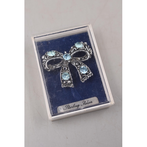 95 - Sterling Silver Bow Brooch with Turquoise Stones Complete with Presentation Box